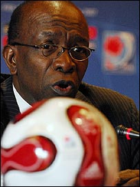 Jack Warner with ball in front of him